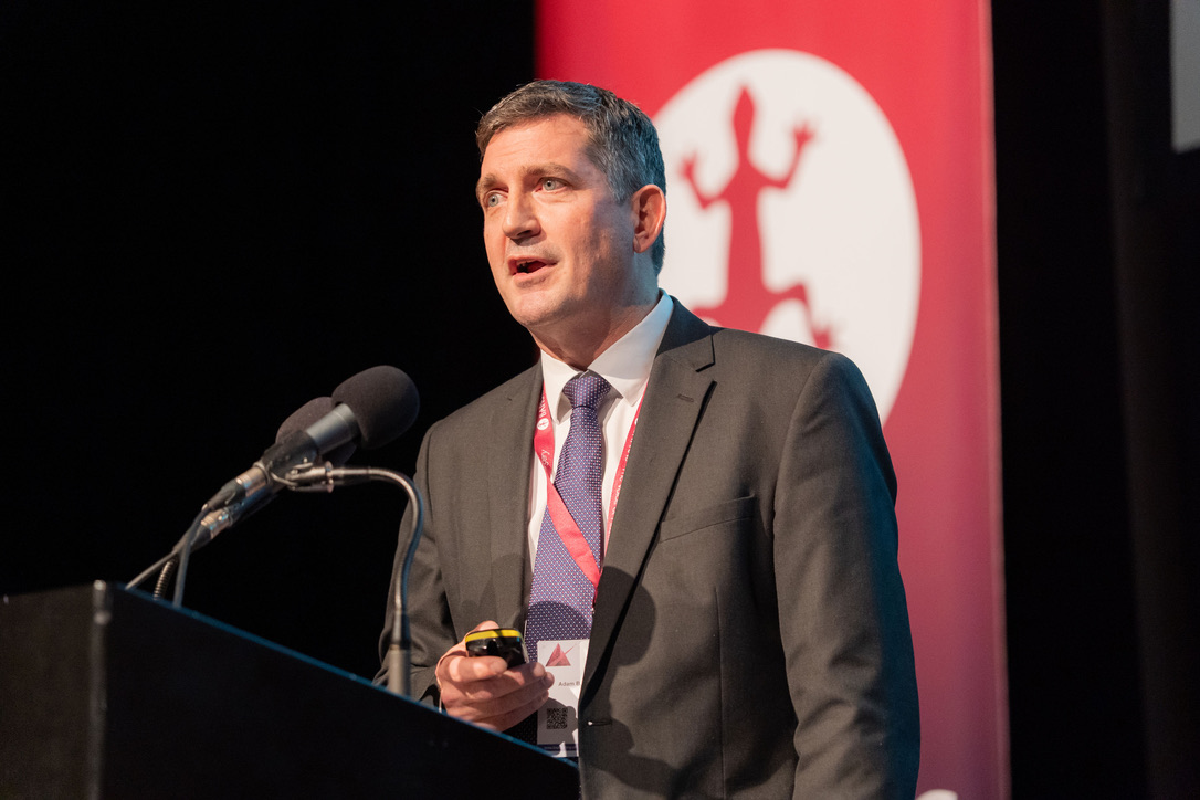 Mr. Adam Blackburn speaking at BAPRAS 2025